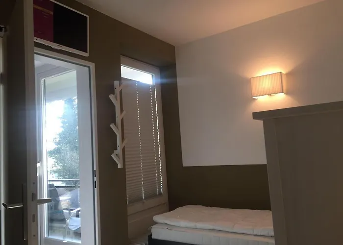 아파트 50-meter-bis-zum-strand-luetje-loge 티멘도르프스트랜드